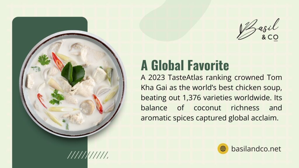A bowl of Tom Kha Gai soup with coconut and spices, promoted as the 2023 TasteAtlas best chicken soup by Basil & Co.