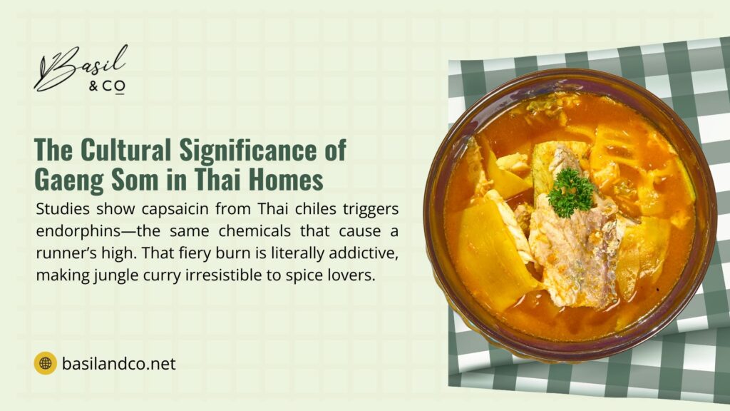 Gaeng Som curry in a brown bowl on a checkered cloth, featuring fish and vegetables, culturally significant in Thai homes for its addictive spicy burn from capsaicin.